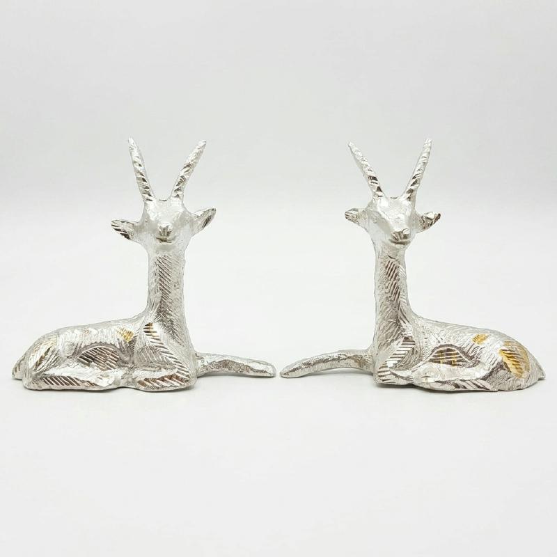 White Metal Sitting Deer Pair