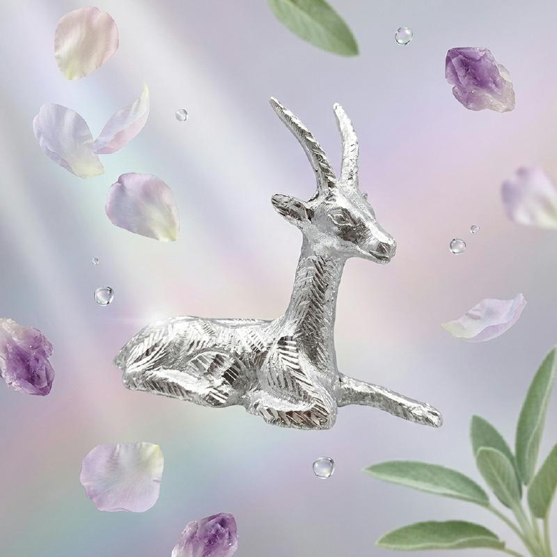 White Metal Sitting Deer Pair